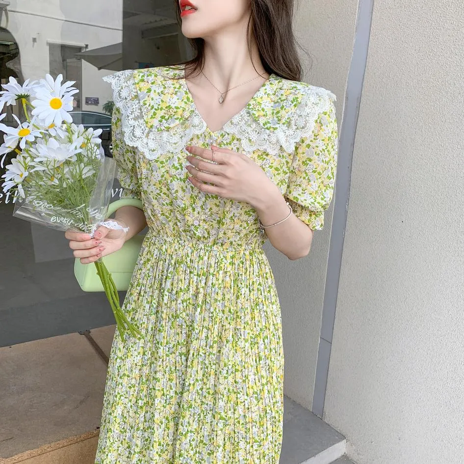 Elegant A-line Dress Featuring Pleats and a Floral Design