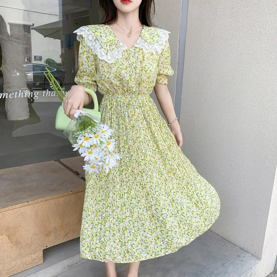 Elegant A-line Dress Featuring Pleats and a Floral Design