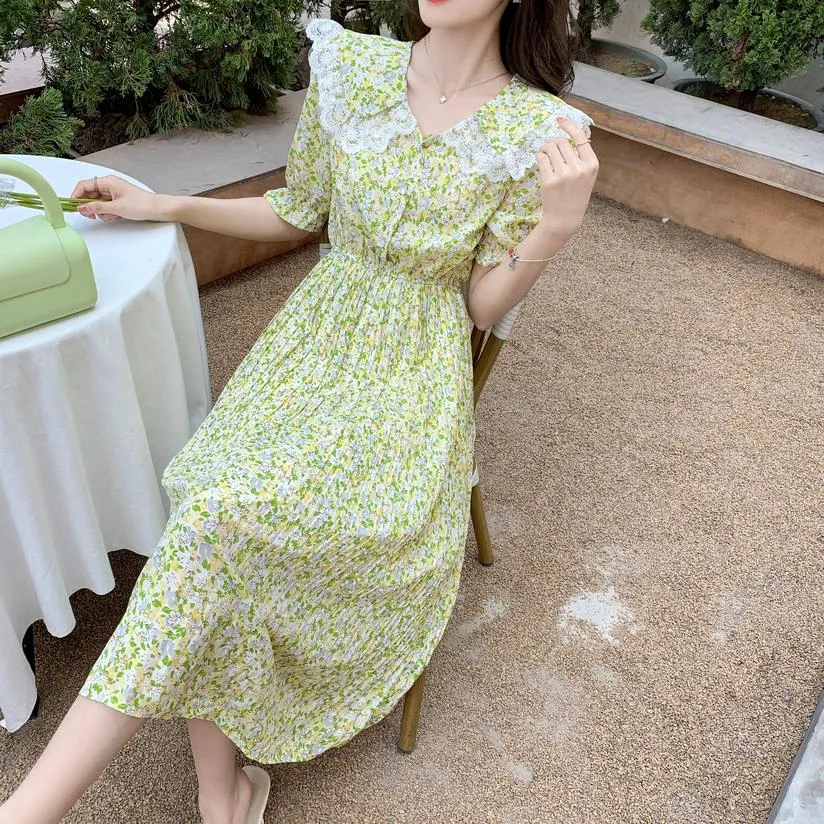 Elegant A-line Dress Featuring Pleats and a Floral Design