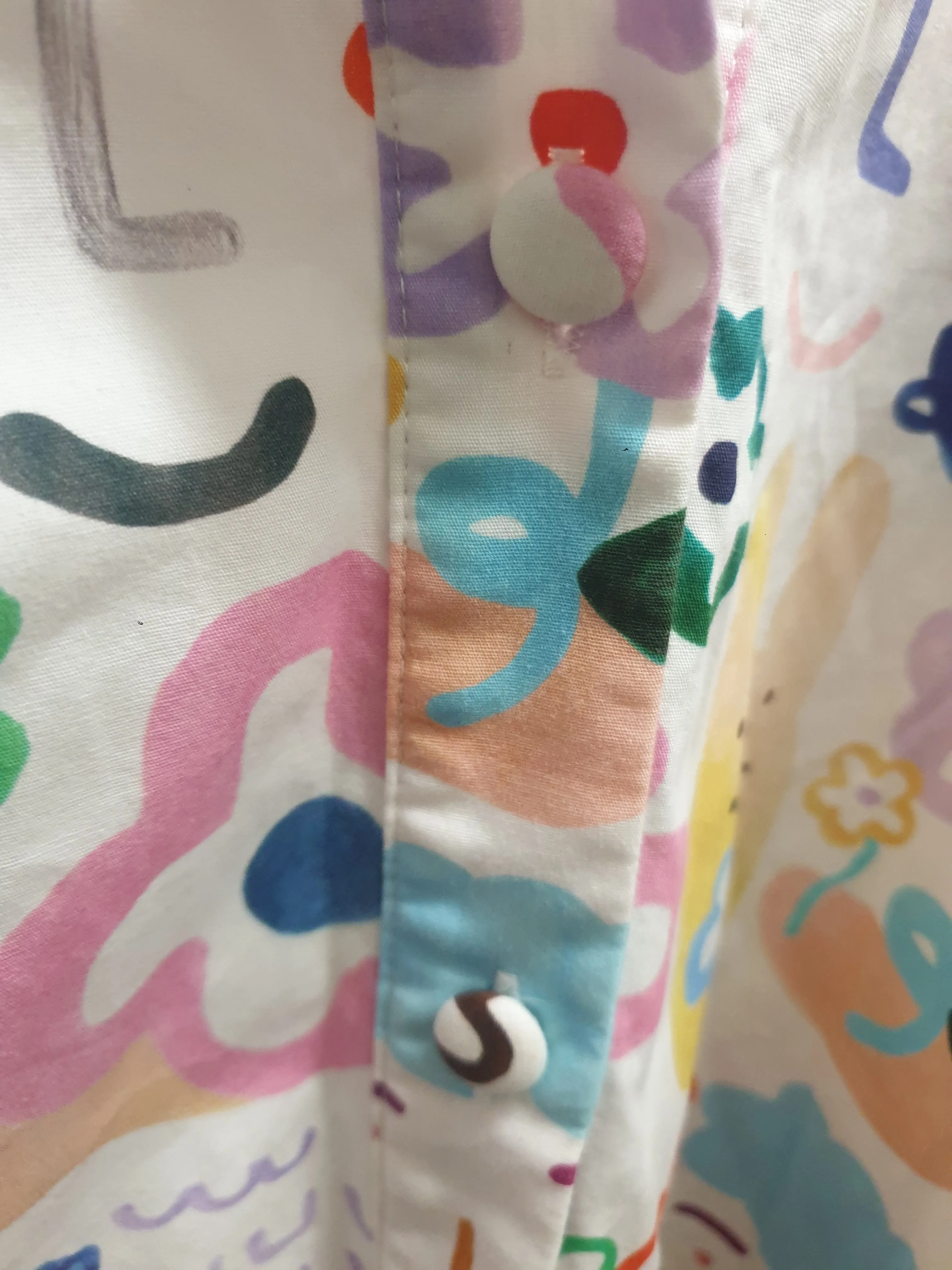 Jericho Road white oversized shirt with fun and bright print size 10