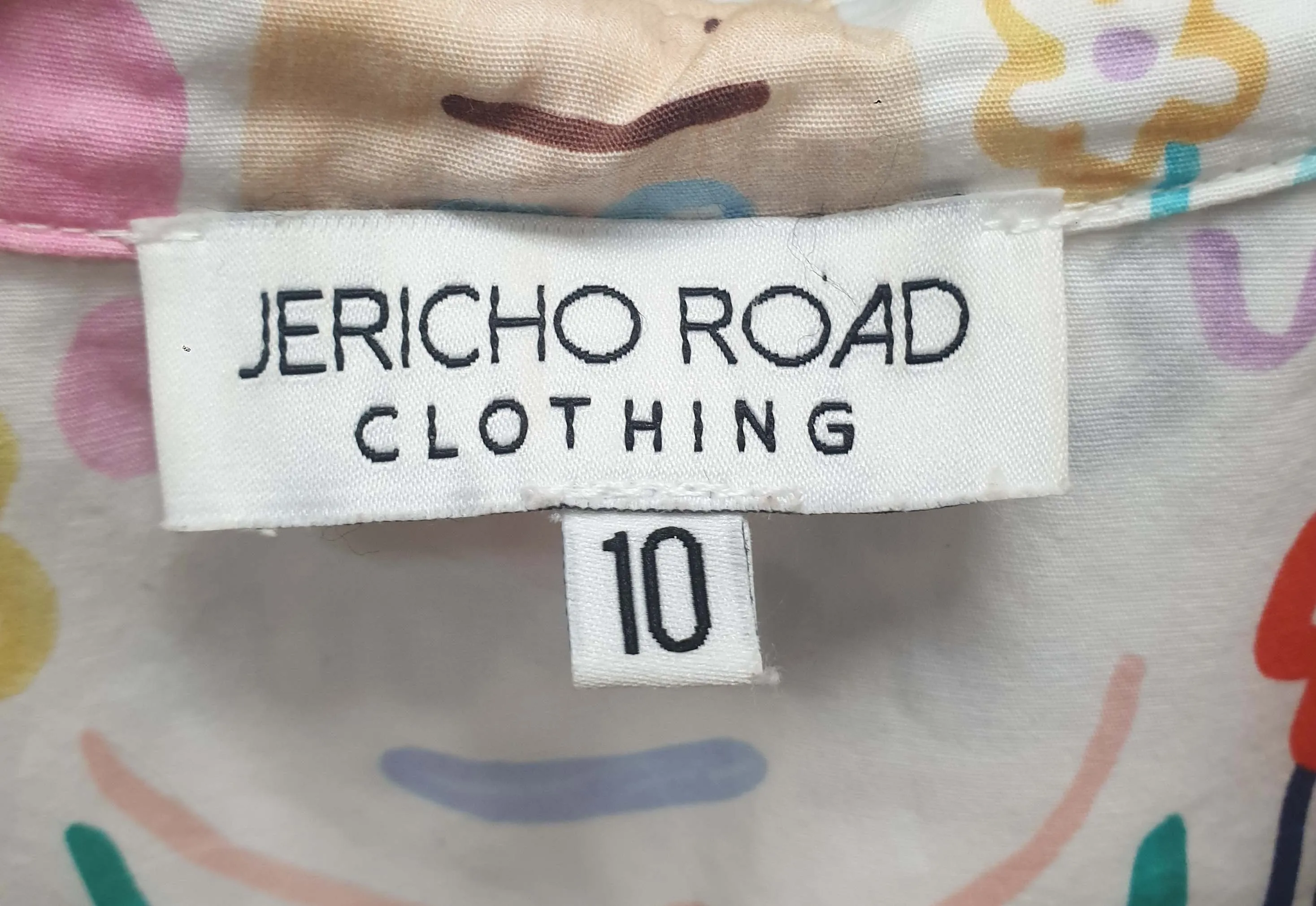 Jericho Road white oversized shirt with fun and bright print size 10