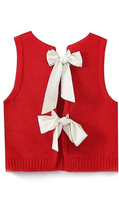 Open back bow sweater