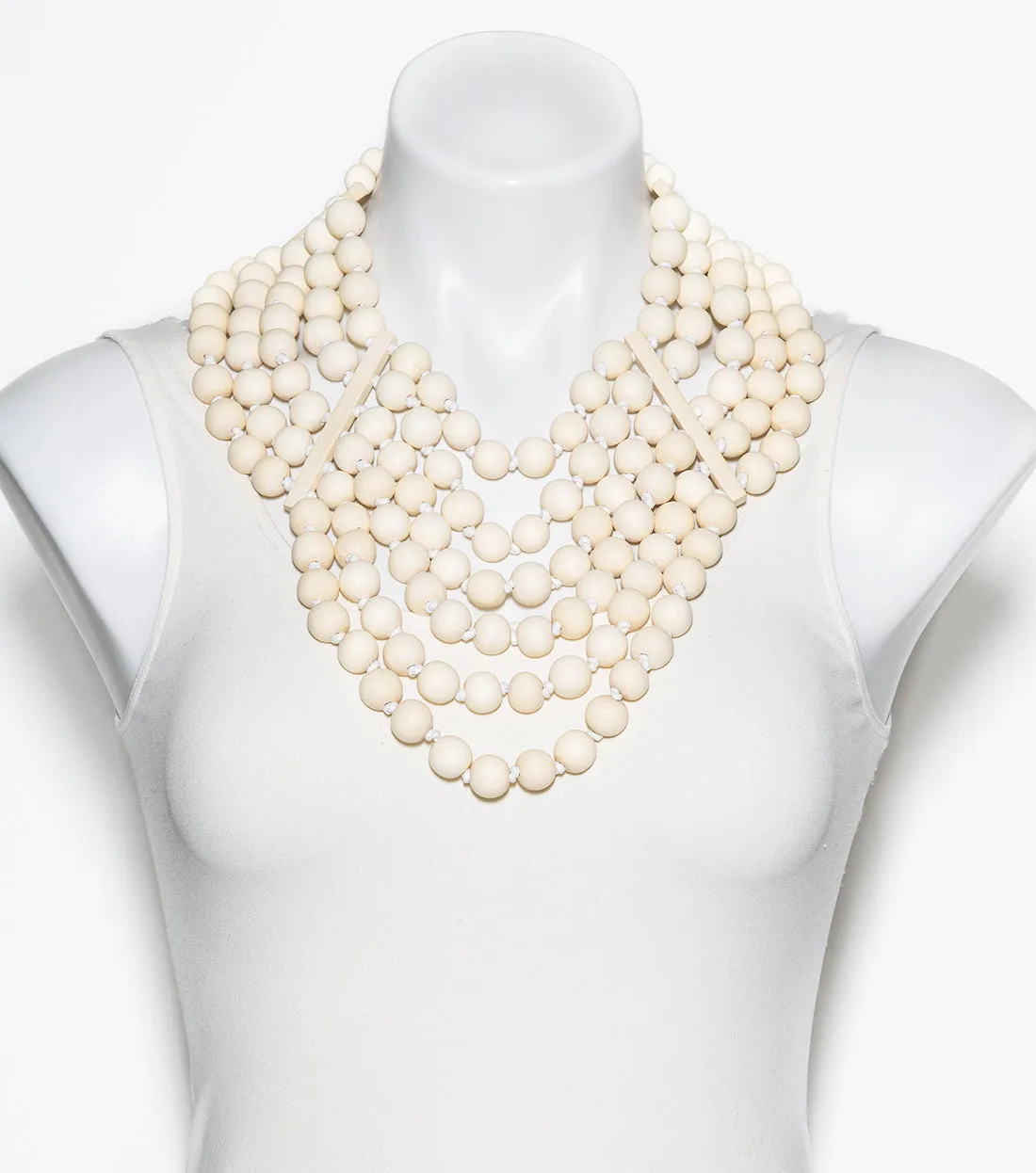 WOOD BEADED STATEMENT NECKLACE. WHITE